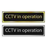 CCTV In Operation door sign in polished gold and polished chrome effect laminate - 50 x 200mm