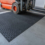 Heavy-duty warehouse entrance mat